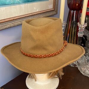 Tan color Dorfman Pacific Co brand this is a western-style hat, often referred